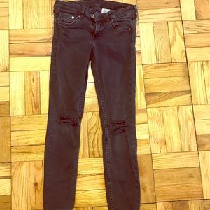 Black, destroyed denim jeans
